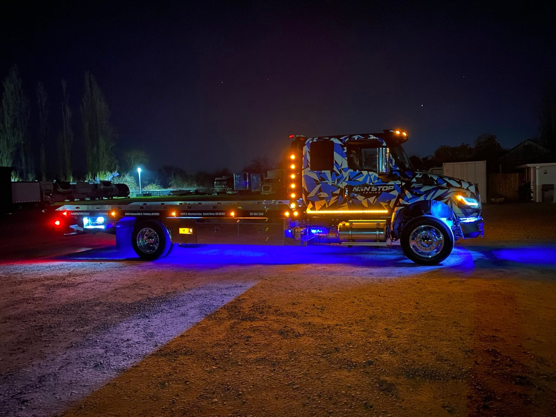 Nighttime accident recovery scene by Non Stop Towing